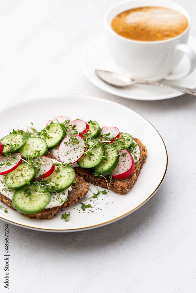 Keto Toasts with cucumber, egg, mozzarella and microgreens. Keto Toasts with cucumber, egg, mozzarella and microgreens.