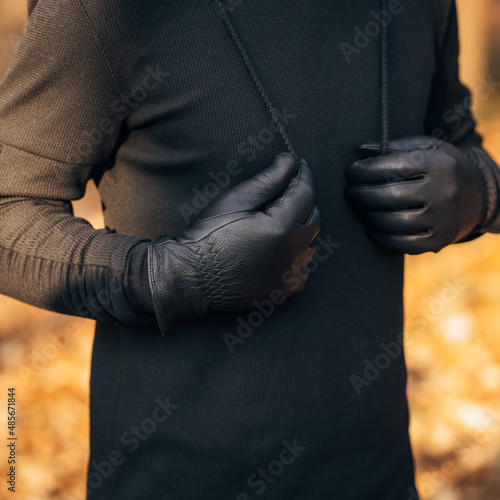 close-up of a man's hands in gloves