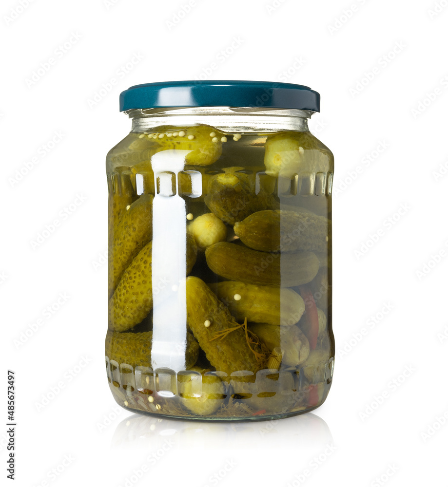 Cucumbers in glass jar isolated on white background. Pickles cucumbers isolated. Cucumbers in glass jar isolated on white background. Pickles cucumbers isolated.