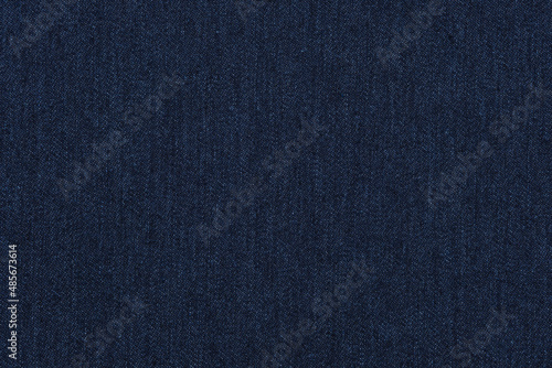 Canvas Print Blue jeans texture. Dark blue denim background.