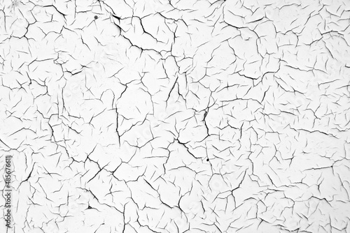 White cracked texture. Damaged, aged and weathered surface.
