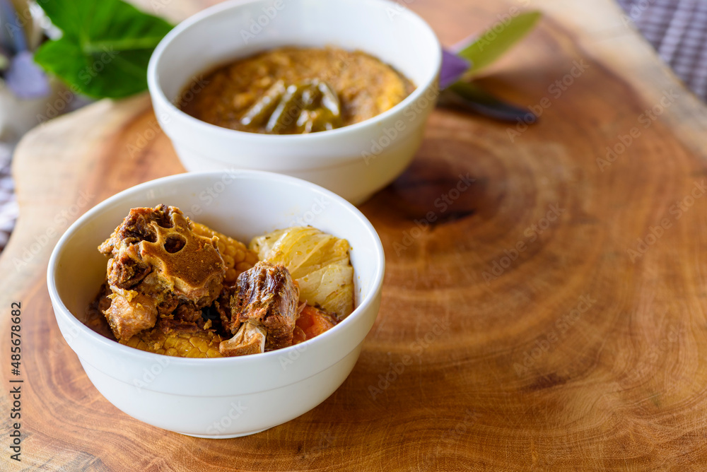 Rabada, oxtail traditional dish of Brazilian cuisine. Made with oxtail meat. Rabada, oxtail traditional dish of Brazilian cuisine. Made with oxtail meat.