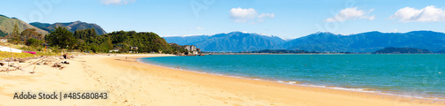 Panoramic Photo of Golden Sand and Mountains at Tata Beach, Golden Bay, South Island, New Zealand © Matthew