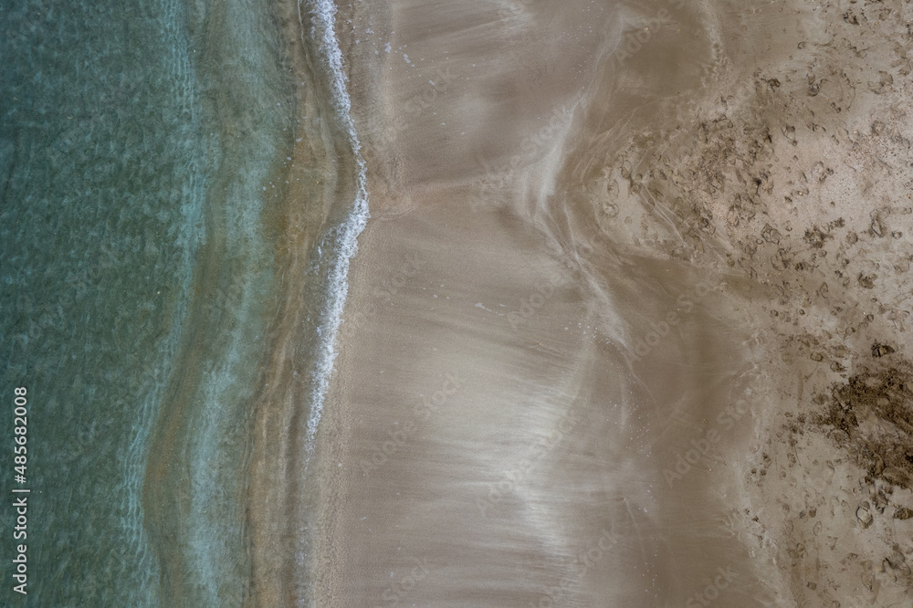 Aerial view drone of empty tropical sandy beach with golden sand. Seascape background Aerial view drone of empty tropical sandy beach with golden sand. Seascape background