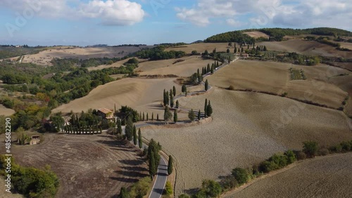 Monticchiello aerial view in Val d'Orcia Tuscany, famous winding cypress road