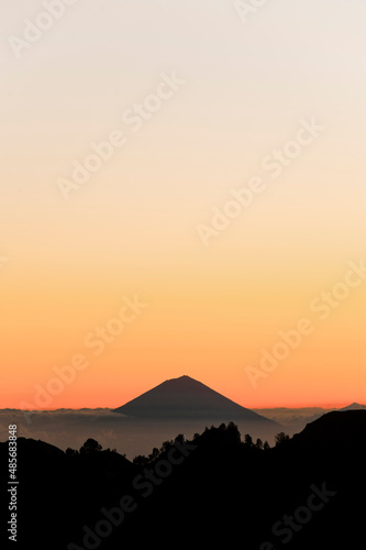 Mount Agung Silhouetted at Sunset from Mount Rinjani, Lombok, Indonesia, Asia, background with copy space