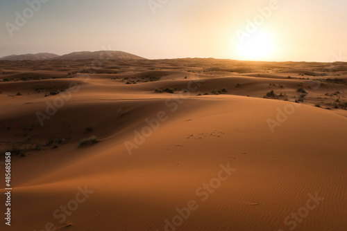 Erg Chebbi sunrise, Sahara Desert near Merzouga, Morocco, North Africa, Africa, background with copy space