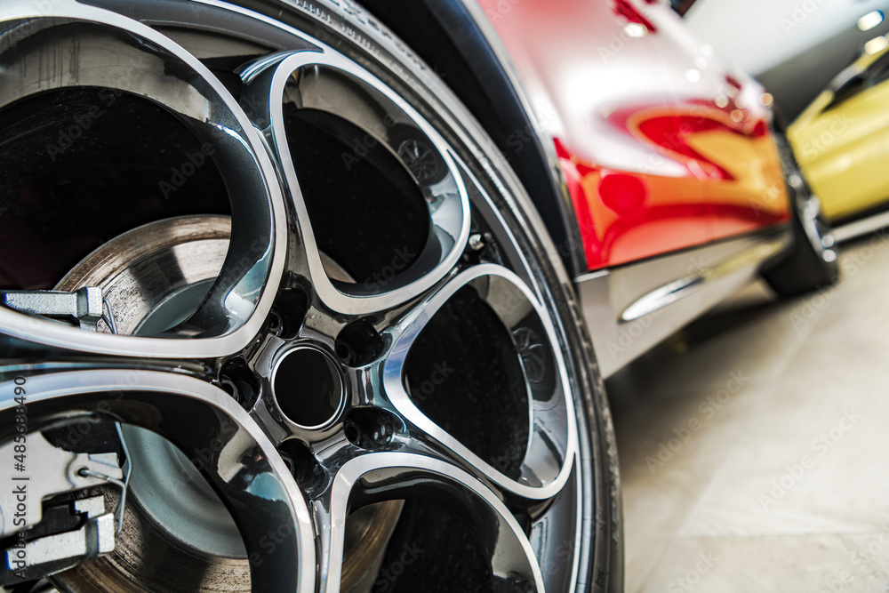 Vehicles For Sale Inside Car Dealer Showroom Wheel Close Up