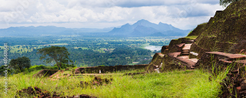 Ruins of King Kassapa's Palace in front of the view from of Sigiriya Rock Fortress, UNESCO World Heritage Site, Sri Lanka, Asia photo