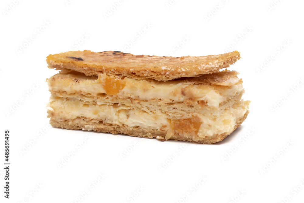 A delicious millefeuille piece of fruit. Isolated on white background. A delicious millefeuille piece of fruit. Isolated on white background.