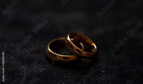 wedding rings on black