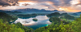 Beautiful Lake Bled and mountain landscape under dramatic sunset sky and clouds, seen from Osojnica Hill, Julian Alps, Gorenjska, Slovenia, Europe