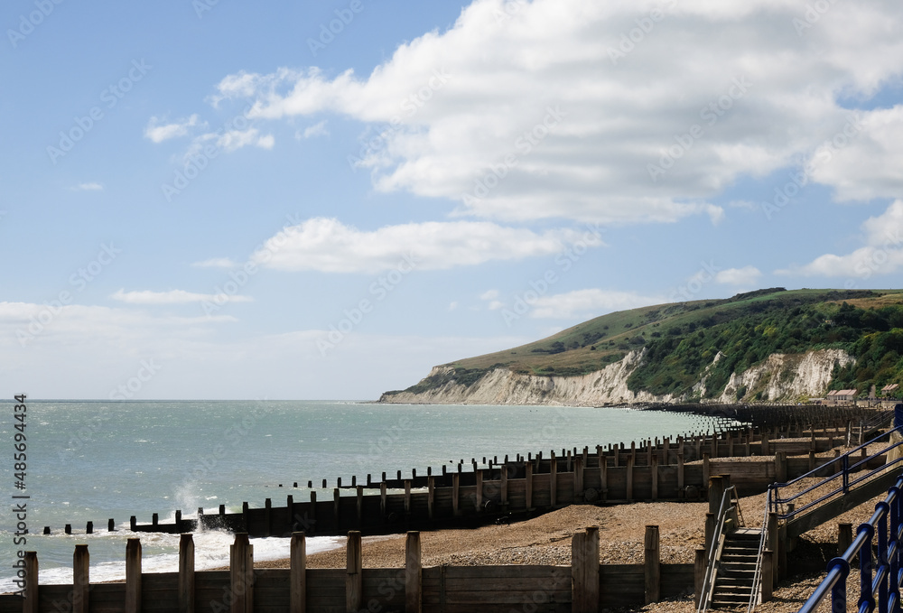 Summer view of Eastbourne Beachside with Seven Sisters white cliffs in the background Summer view of Eastbourne Beachside with Seven Sisters white cliffs in the background