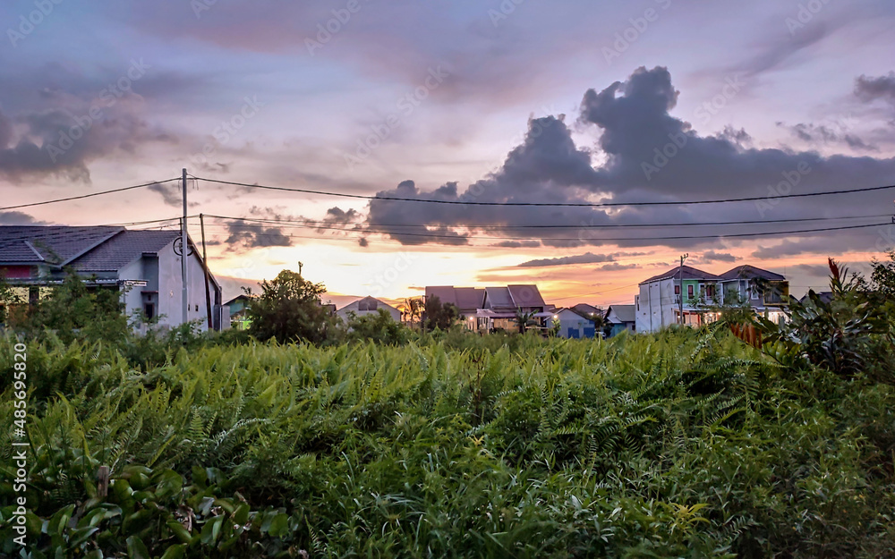 Beautiful sunset over the village in South Borneo, Indonesia Beautiful sunset over the village in South Borneo, Indonesia