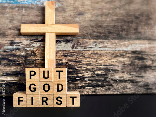 Fotografie Religion Concept - put GOD first text in vintage background