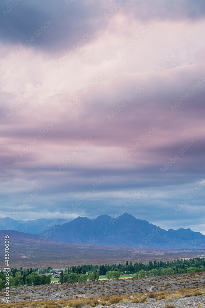Andes Mountains surrounding Uspallata at sunset, Mendoza Province, Argentina, South America, background with copy space