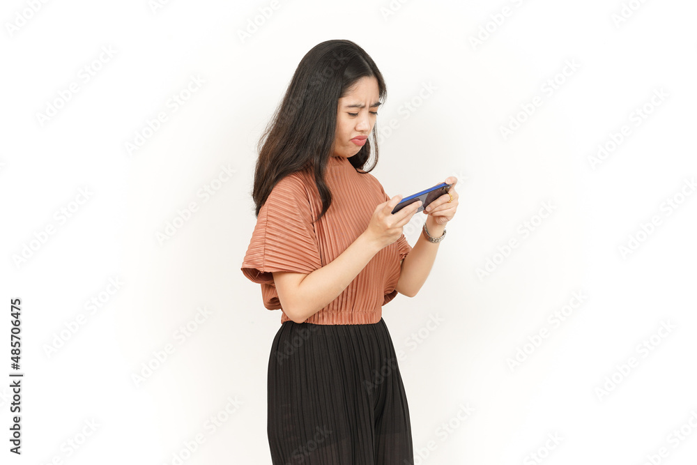 Playing Game on Smartphone Of Beautiful Asian Woman Isolated On White Background Playing Game on Smartphone Of Beautiful Asian Woman Isolated On White Background