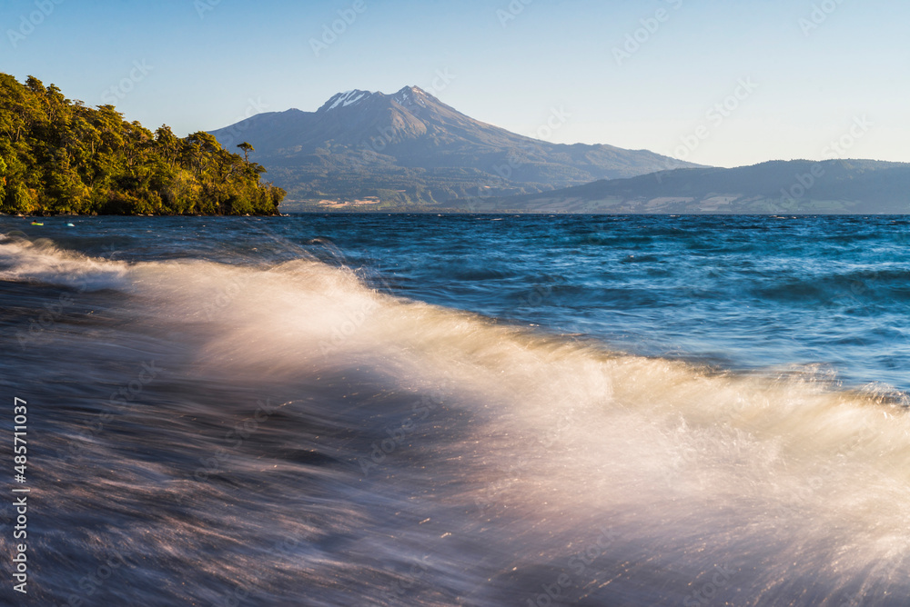Calbuco Volcano at sunset, seen from a beach on Llanquihue Lake, Chilean Lake District, Chile, South America