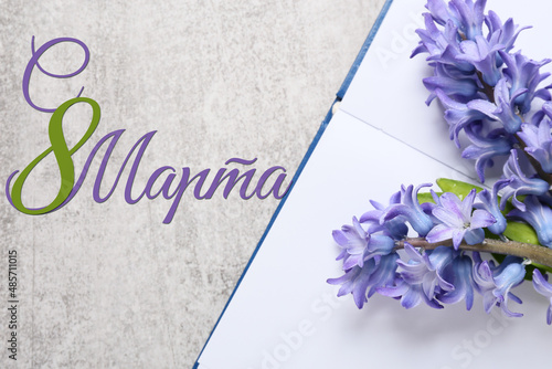 Beautiful greeting card for International Women's Day with hyacinth flowers