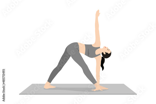 Revolved Half Moon Pose. Beautiful girl practice Parivrtta Ardha Chandrasana. Young attractive woman practicing yoga exercise. working out, black wearing sportswear, grey pants and top