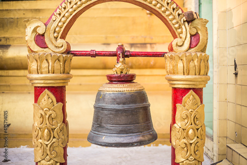 Buddhist prayer bell at Sule Paya (Sule Pagoda), Yangon (Rangoon), Myanmar (Burma) photo