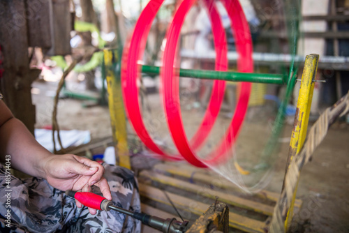 Weaving at Twante, accross the river from Yangon, Myanmar (Burma) photo