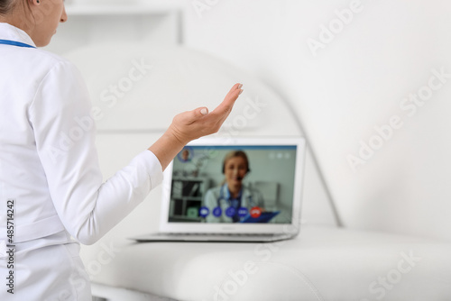 Female doctor video chattin...