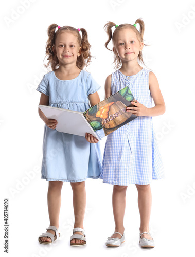 Adorable little sisters wit...
