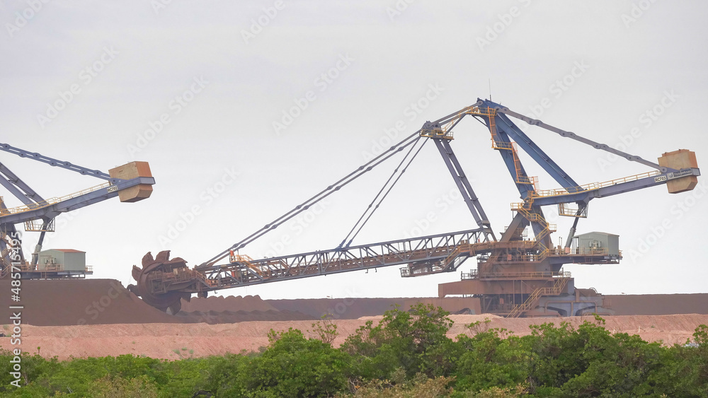an iron ore stacker loader in operation at port hedland an iron ore stacker loader in operation at port hedland