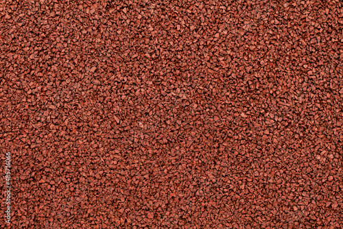 Suelo de piedras pequeñas color terracota