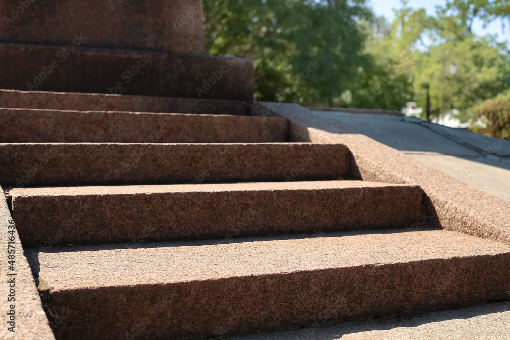 View of stairs in park on sunny day View of stairs in park on sunny day