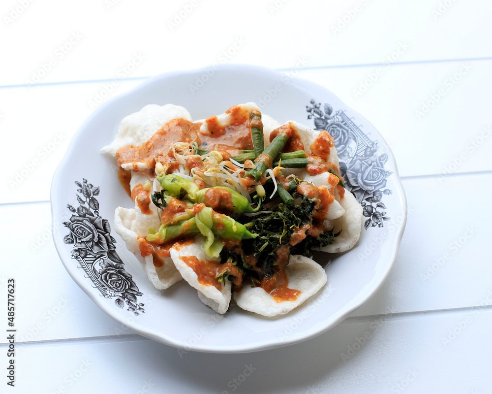Kerupuk Pecel, Cracker Made from Tapioca Flour with Steamed Vegetable and Sambel Pecel Kerupuk Pecel, Cracker Made from Tapioca Flour with Steamed Vegetable and Sambel Pecel
