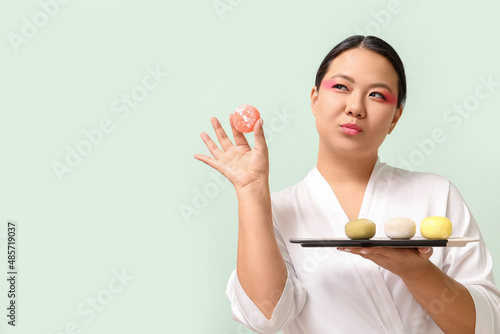 Beautiful Asian woman with ...