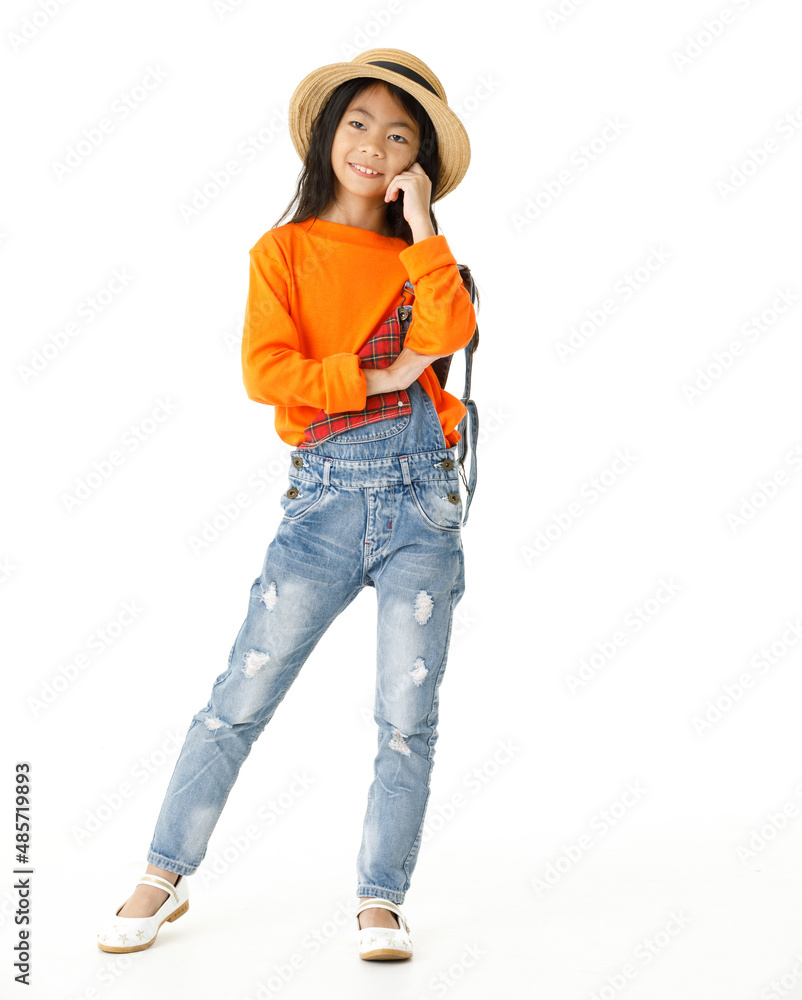 Portrait cutout isolated closeup studio shot Asian pout resentful frowning bored unhappy young schoolgirl in casual overalls outfit standing holding hand at cheek look at camera on white background Portrait cutout isolated closeup studio shot Asian pout resentful frowning bored unhappy young schoolgirl in casual overalls outfit standing holding hand at cheek look at camera on white background
