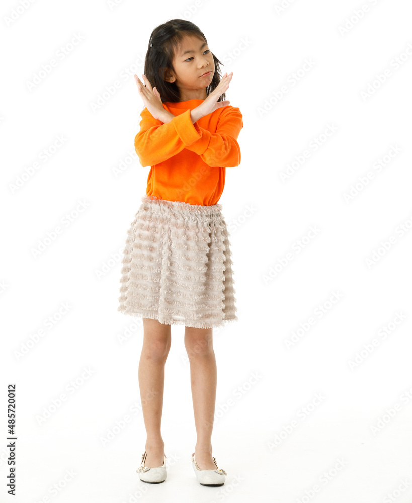 Full body cutout isolated studio shot of Asian young primary schoolgirl model in casual orange shirt and skirt outfit standing on white background Full body cutout isolated studio shot of Asian young primary schoolgirl model in casual orange shirt and skirt outfit standing on white background