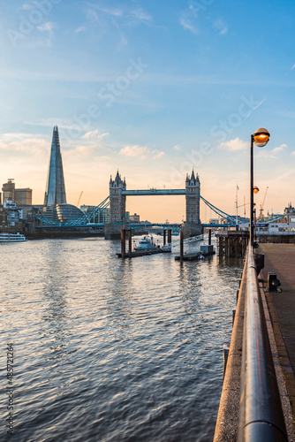 Tower Bridge and the Shard at sunset, seen behind the River Thames, Tower Hamlets, London, England