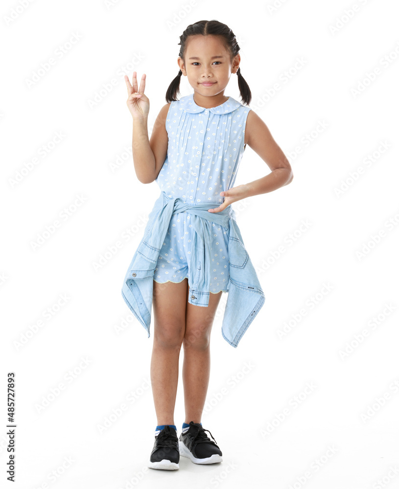Portrait full body studio cutout shot of Asian young happy cheerful pigtail braid hairstyle elementary school girl in blue sleeveless dress standing posing smiling look at camera on white background Portrait full body studio cutout shot of Asian young happy cheerful pigtail braid hairstyle elementary school girl in blue sleeveless dress standing posing smiling look at camera on white background