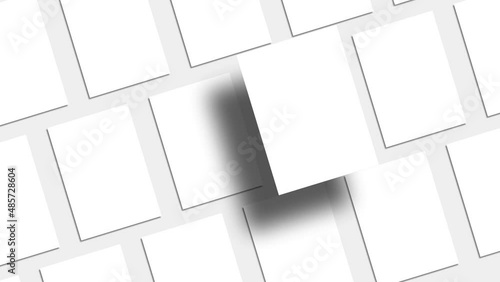 White Diagonal Rectangle mockups lying on neutral Light background (Flat lay Animation). with one different Paper Blank. Branding Identify, Business Cards, Magazine pages. photo
