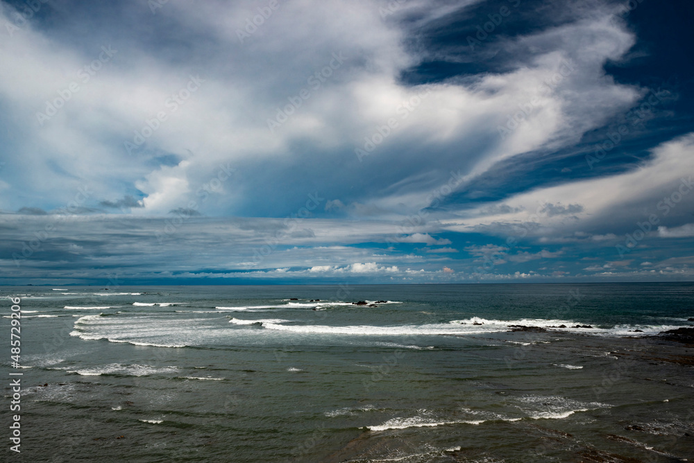 Dramatic coastal landscape at with clouds and ocean at Dominical, near Uvita, Puntarenas Province, Pacific Coast of Costa Rica