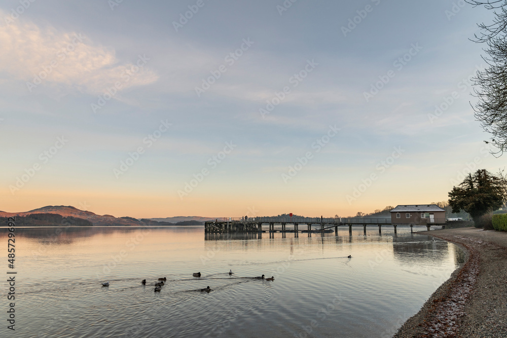 Fototapeta premium Loch Lomond at sunset, seen from Luss, Argyll and Bute, Highlands of Scotland, United Kingdom, Europe