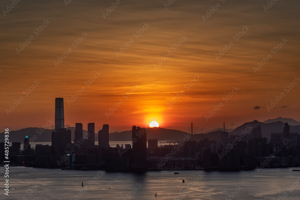 Scenery of sunset over skyline of Hong Kong city