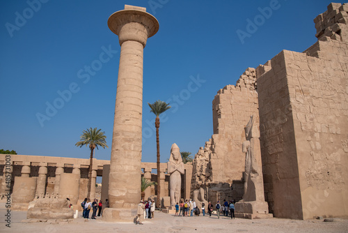 Only surviving column of Taharka (XXV dynasty), statue of Ramesses II and his daughter Bent-Anat in the first courtyard of the Karnak temple in Luxor (destroyed Thebes). Egypt.