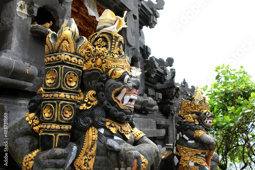 Closeup up of a statue in front of temple around Tanah Lot. Taken January 2022.