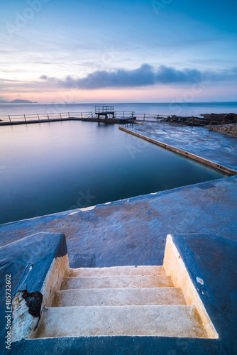 Guernsey Bathing Pools at sunrise, Channel Islands, United Kingdom photo
