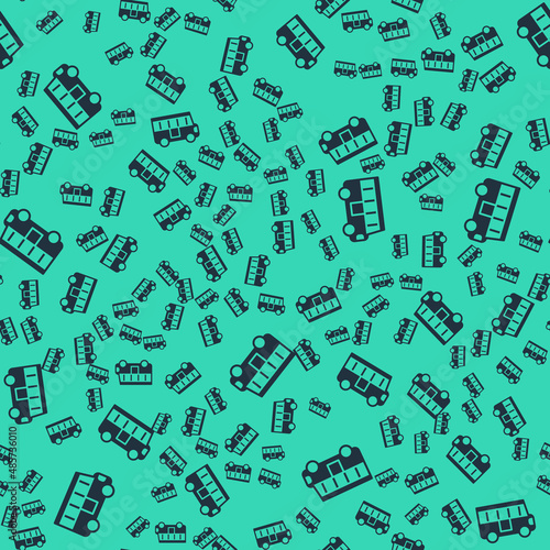 Black School Bus icon isolated seamless pattern on green background. Public transportation symbol. Vector