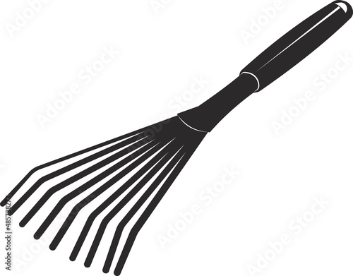 Garden rake for collecting weeds and loosening the soil.