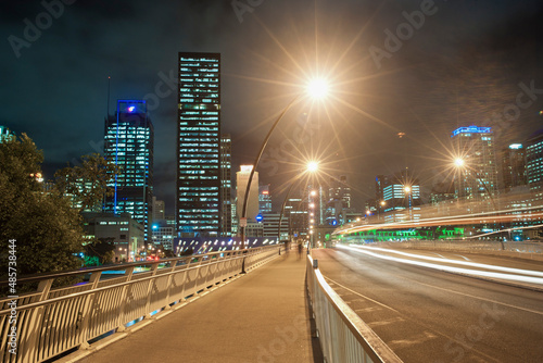 Light Trails at Night Across the Bridge from Brisbane City Centre to South Bank, Queensland, Australia photo