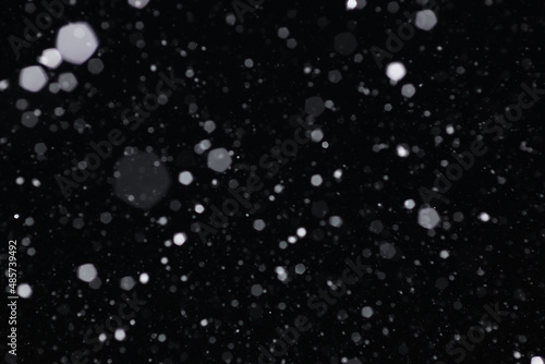 Snow on a black background. Snowflakes for overlay. Snow background.