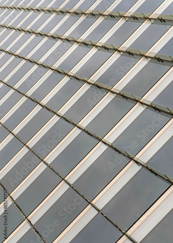 Wallpaper Mural Vertical Tinted glass curtain wall of a building with vertical glass beams at Salt Lake City, Utah Torontodigital.ca