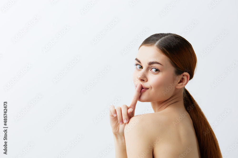 young woman smiling woman bare shoulders clean skin charm light background young woman smiling woman bare shoulders clean skin charm light background
